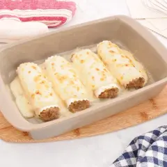 Canelones de carne receta de la abuela, dorados y gratinados en su jugo, listos para disfrutar.